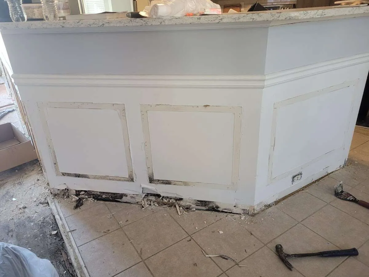 Water damage and mold on kitchen during Storm Damage Restoration in Oswego
